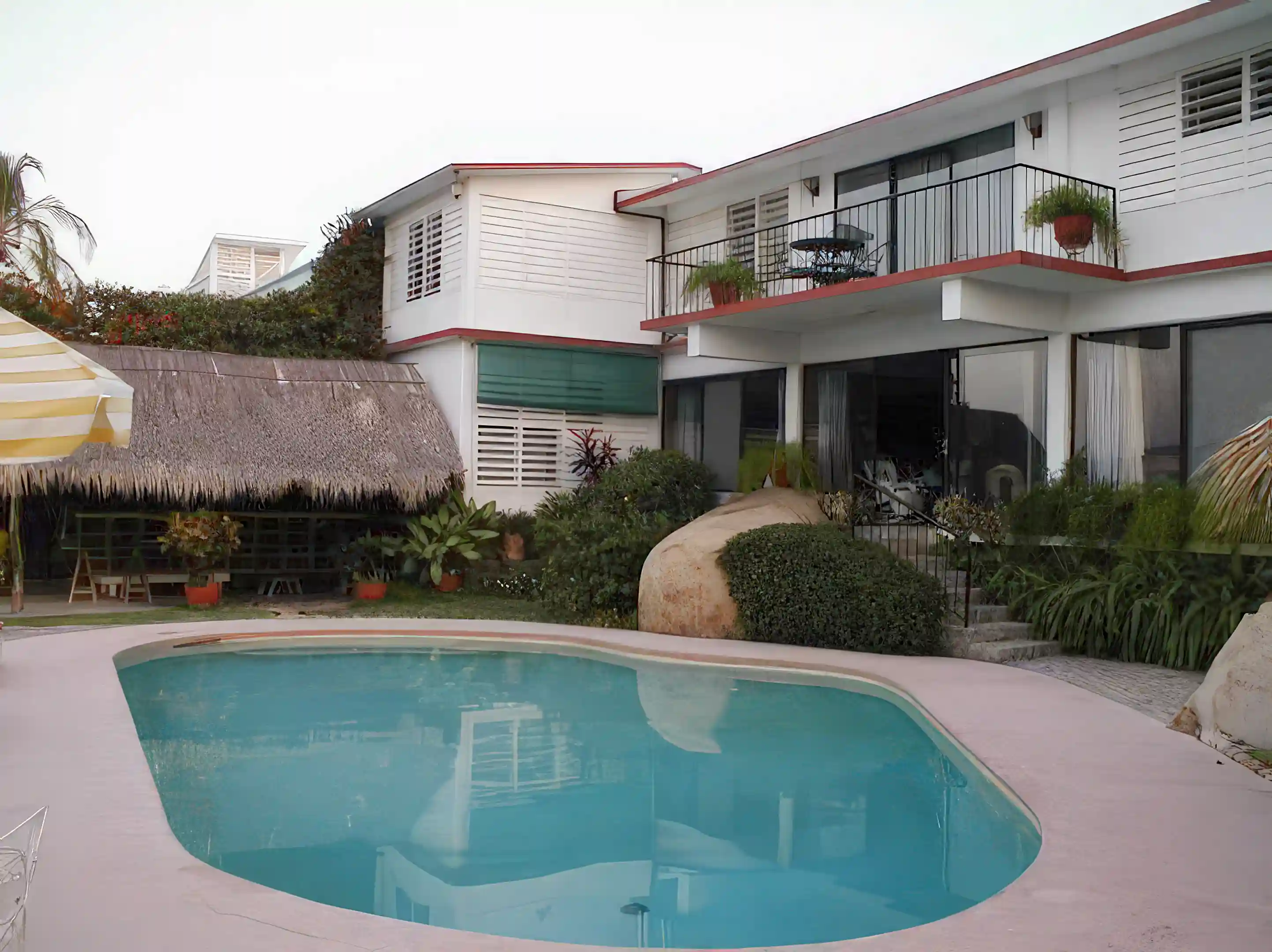 view of house - pool, palapa and terrace
