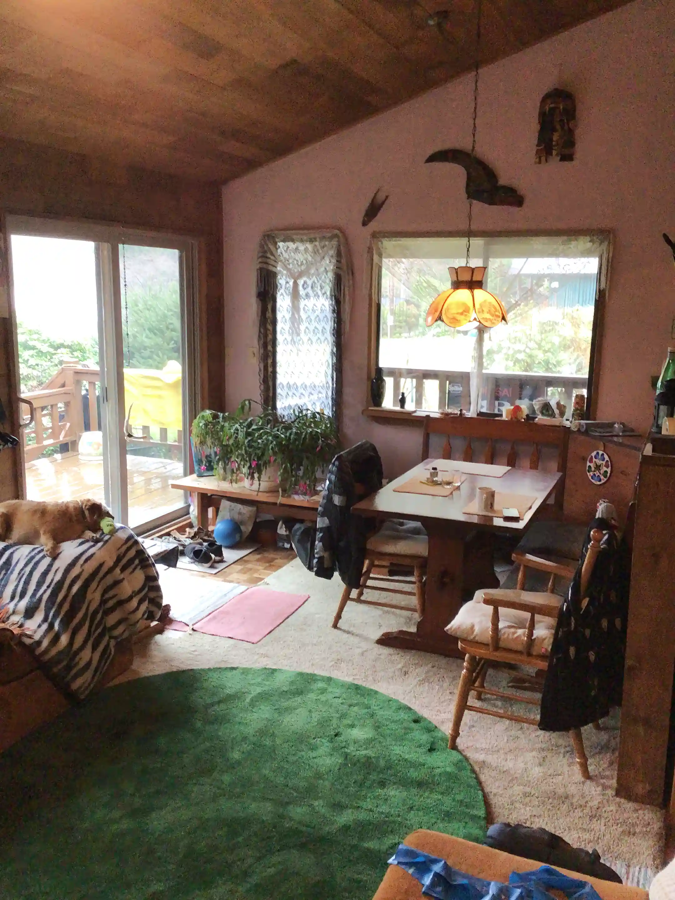 Dining area beside country style kitchen.