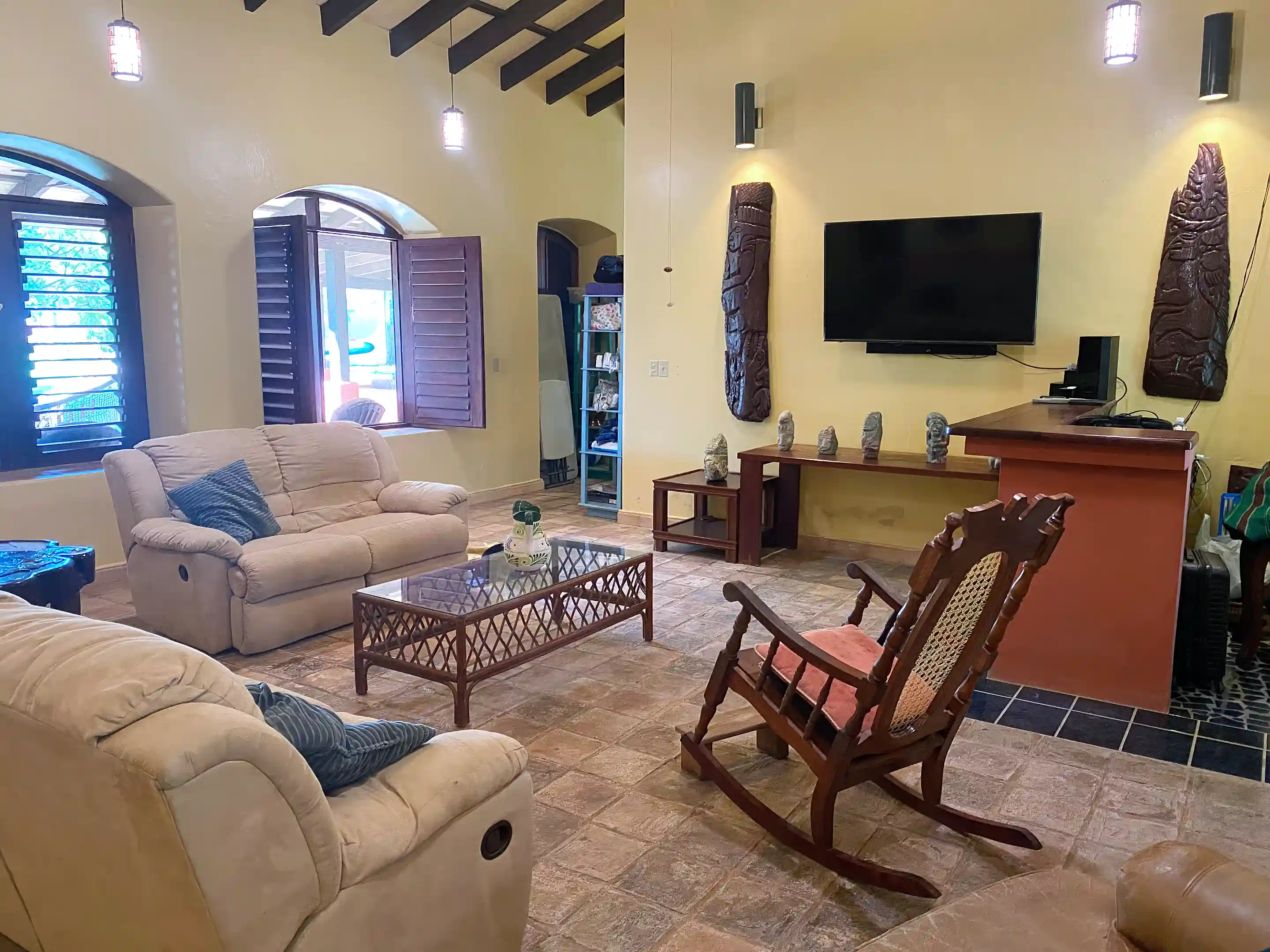 Main Adobe home living room with 25 ft high vaulted...