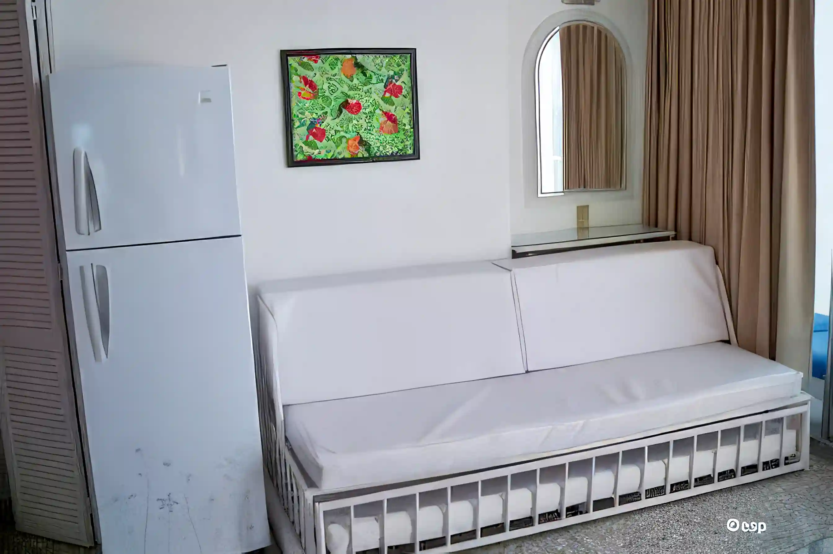 7. Large fridge and freezer. Adjacent daybed with roll-out trundle...