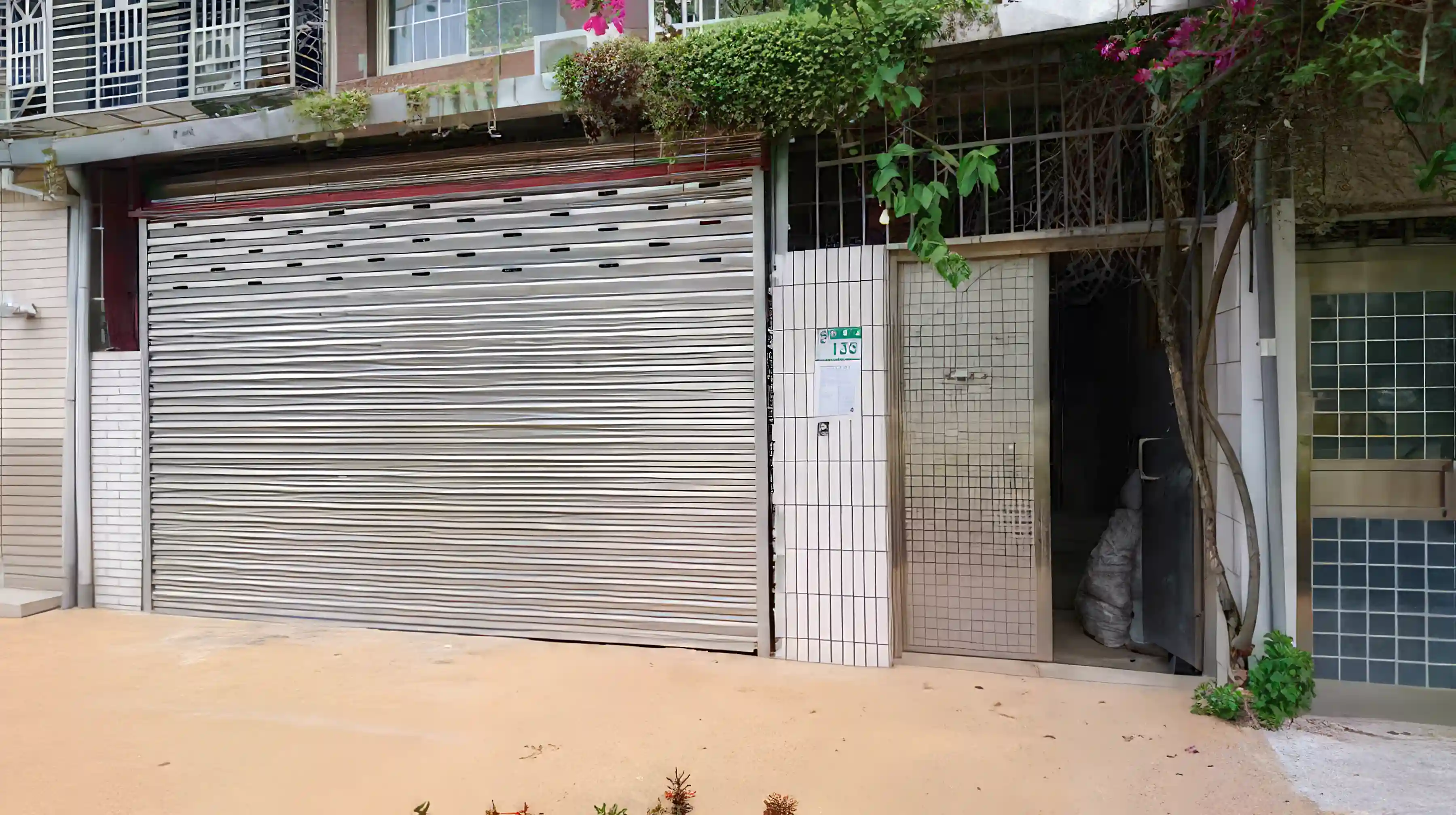 Front door pedestrian passage, and oversized "garage door."