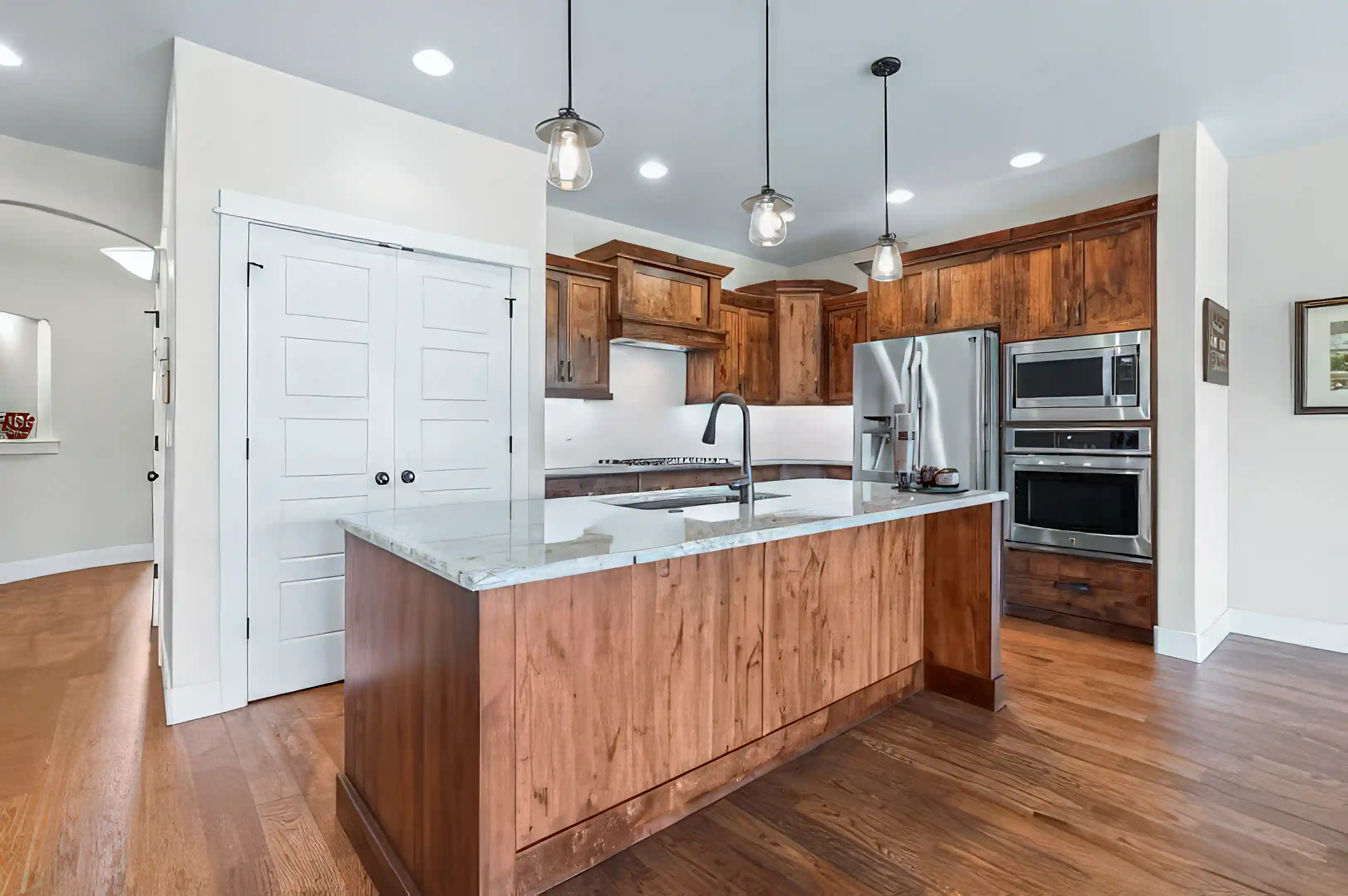 Beautiful alder cabinets and stainless steel appliances