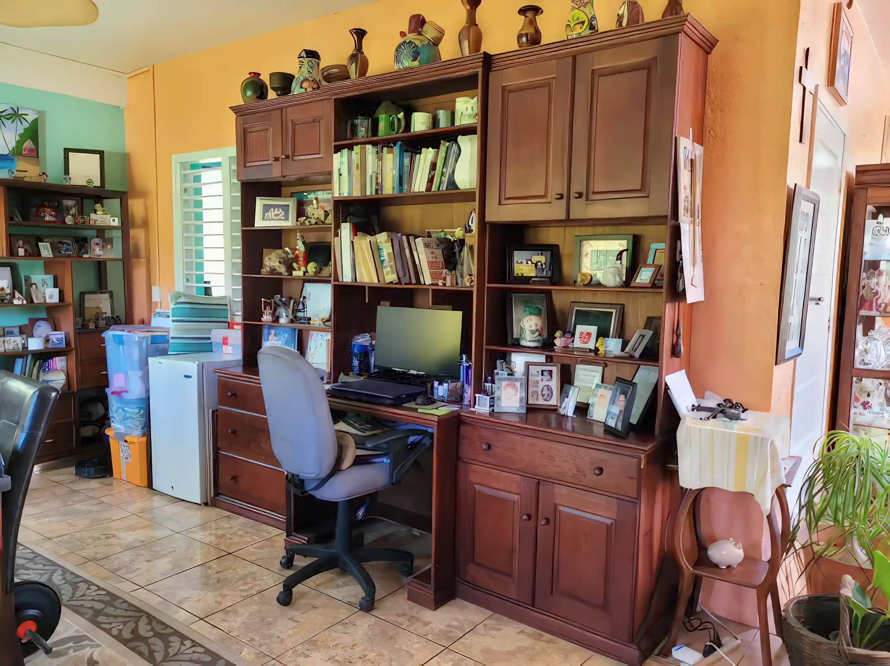 This unit matches the kitchen cabinets and will stay with...