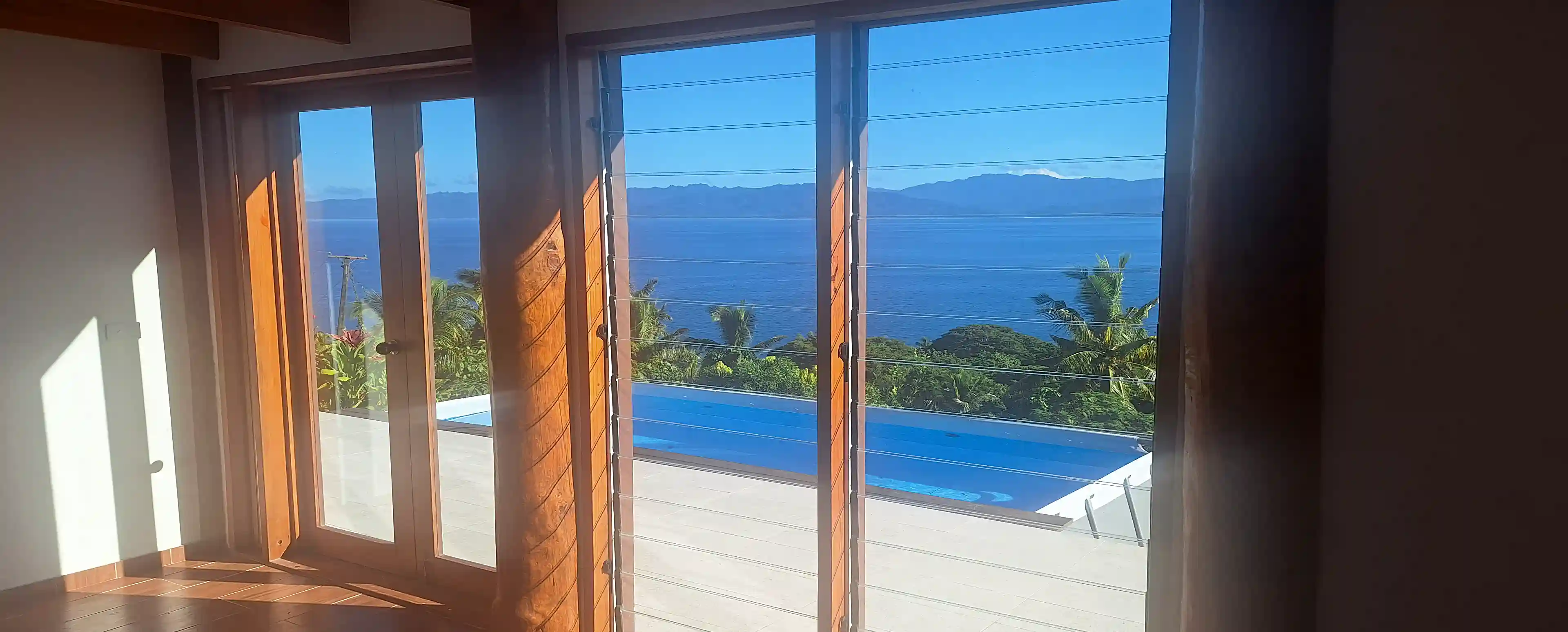 View on terrace, pool and sea from bedroom 3