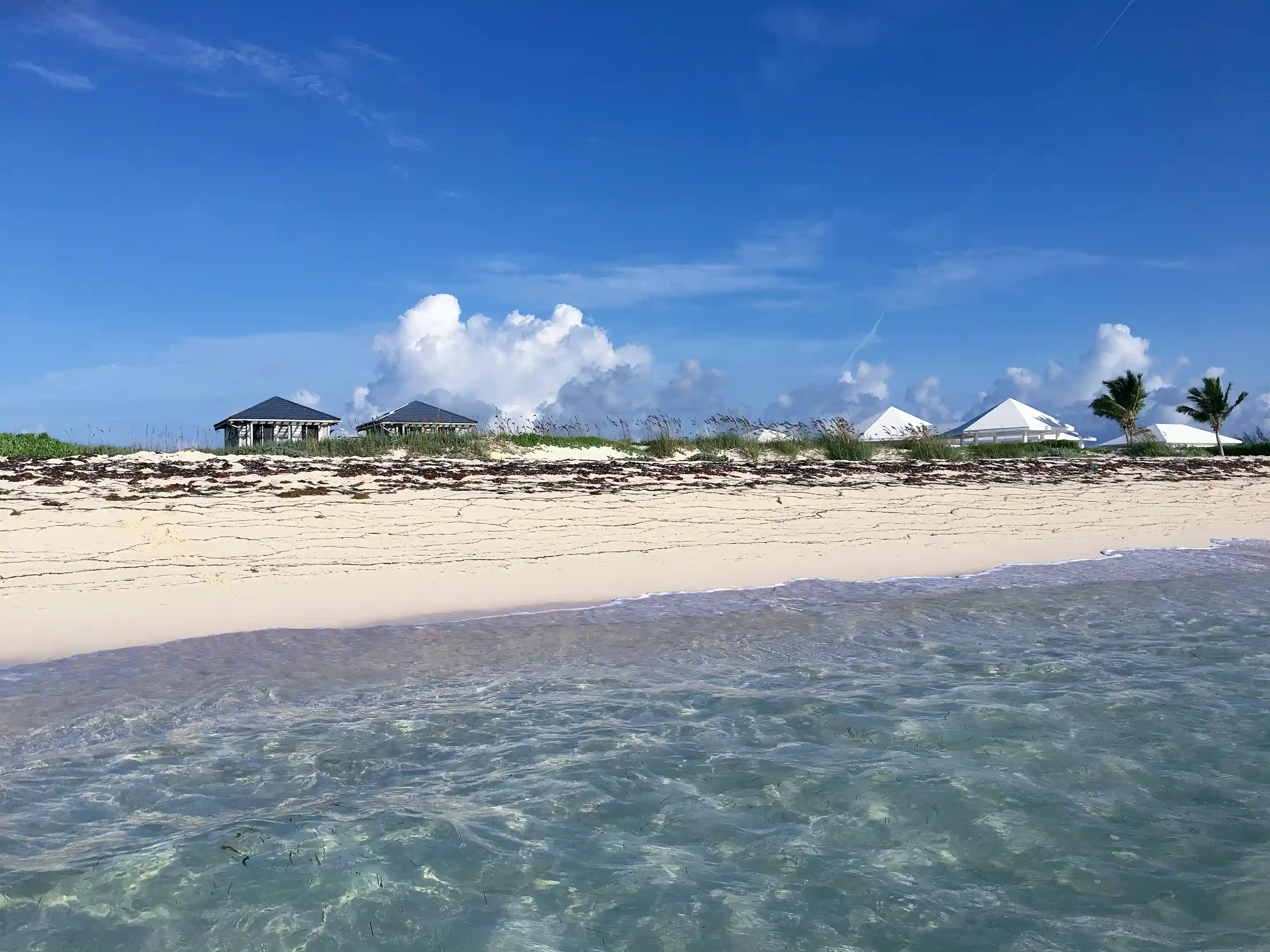 Beach in front of house
