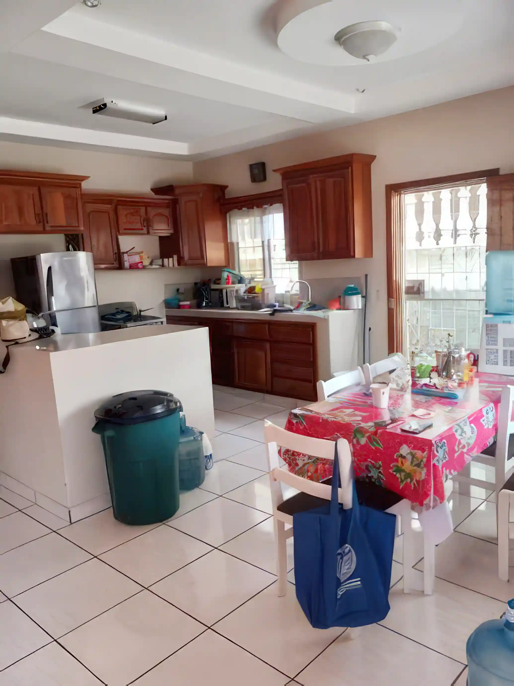 Modern kitchen with appliances & nice custom cabinets.