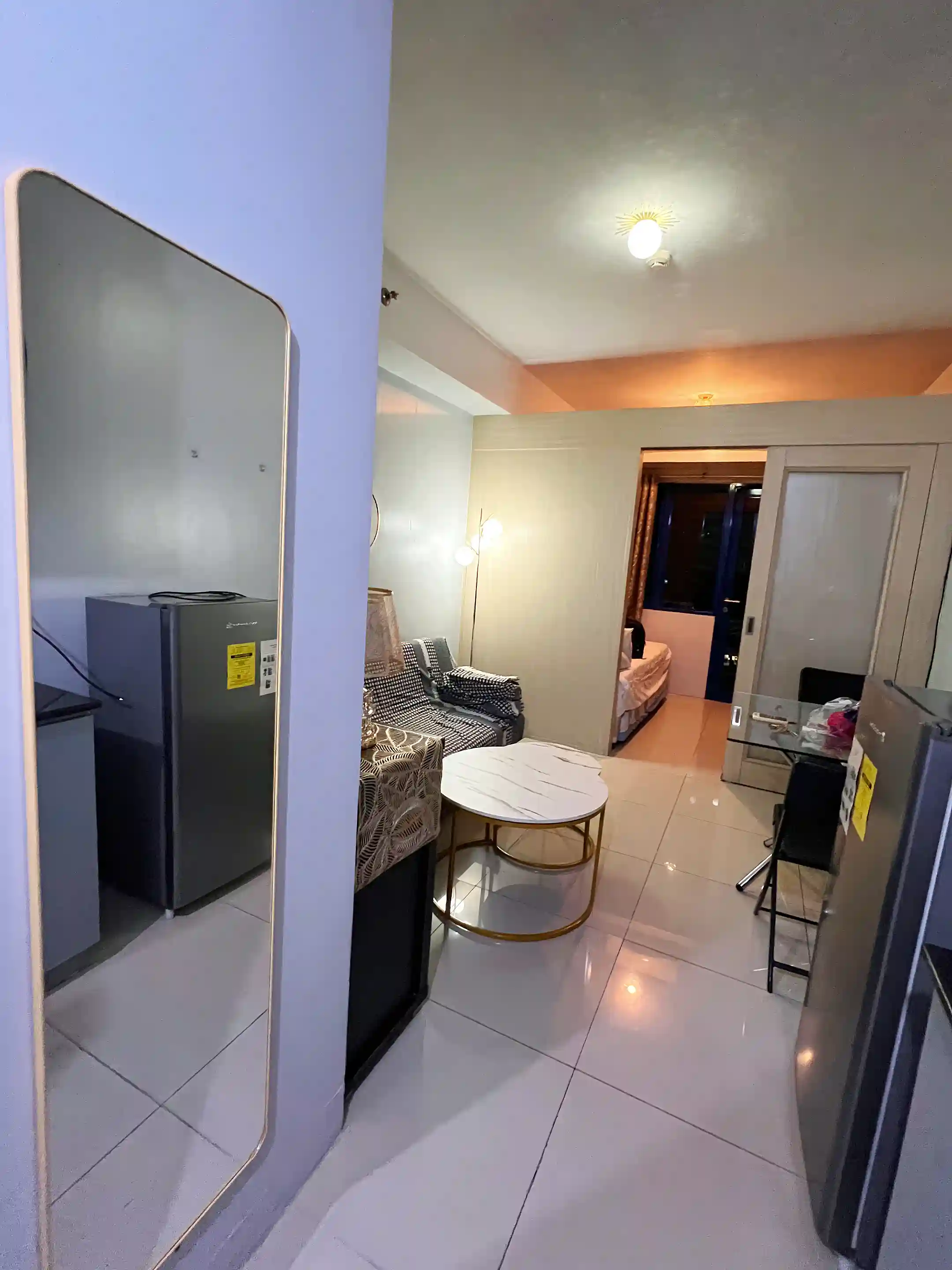 Talk wide mirror T through cozy sofa, dining table and...