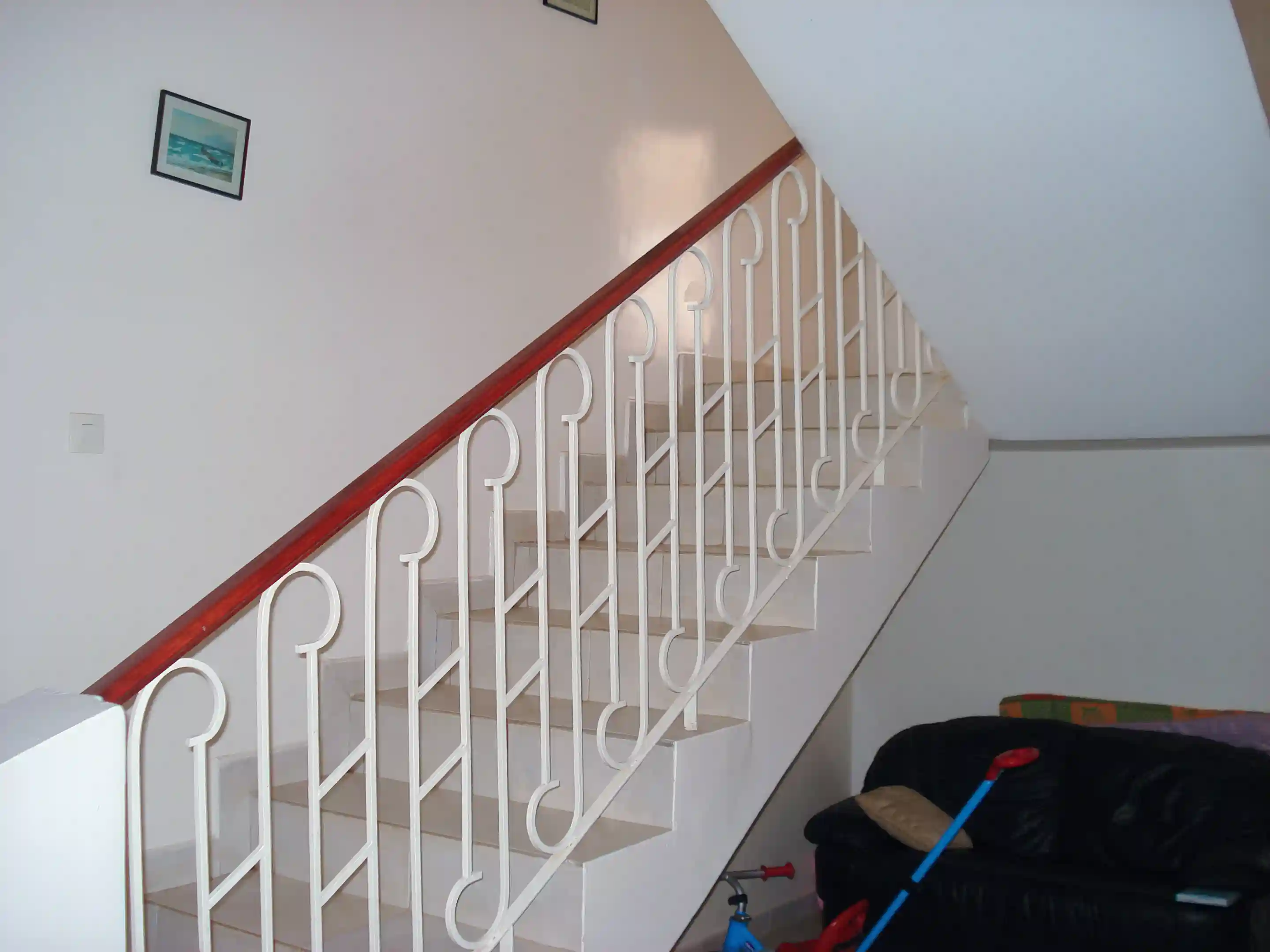 View of staircase connecting the floors.