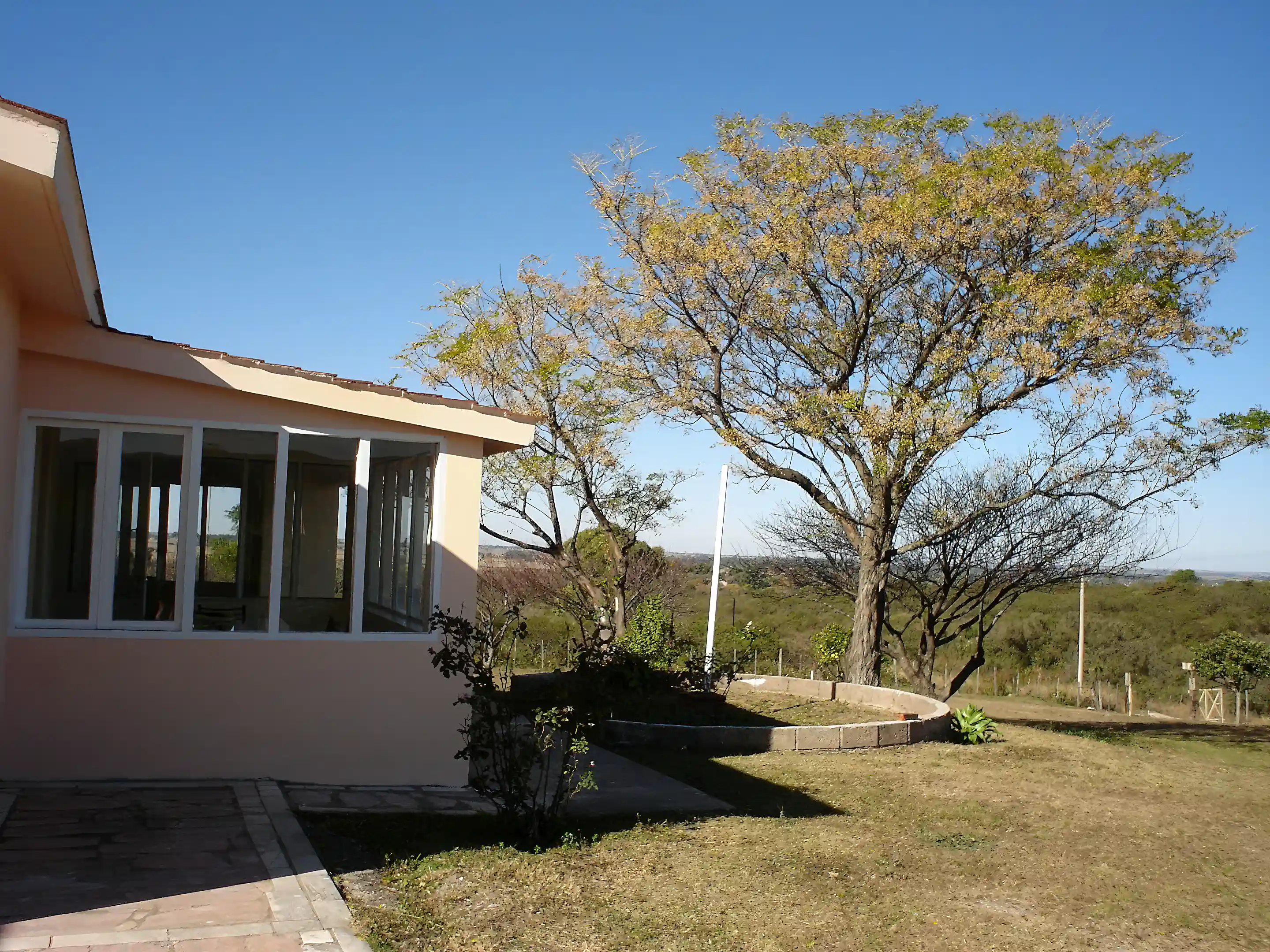 Rear entrance and dining sun room