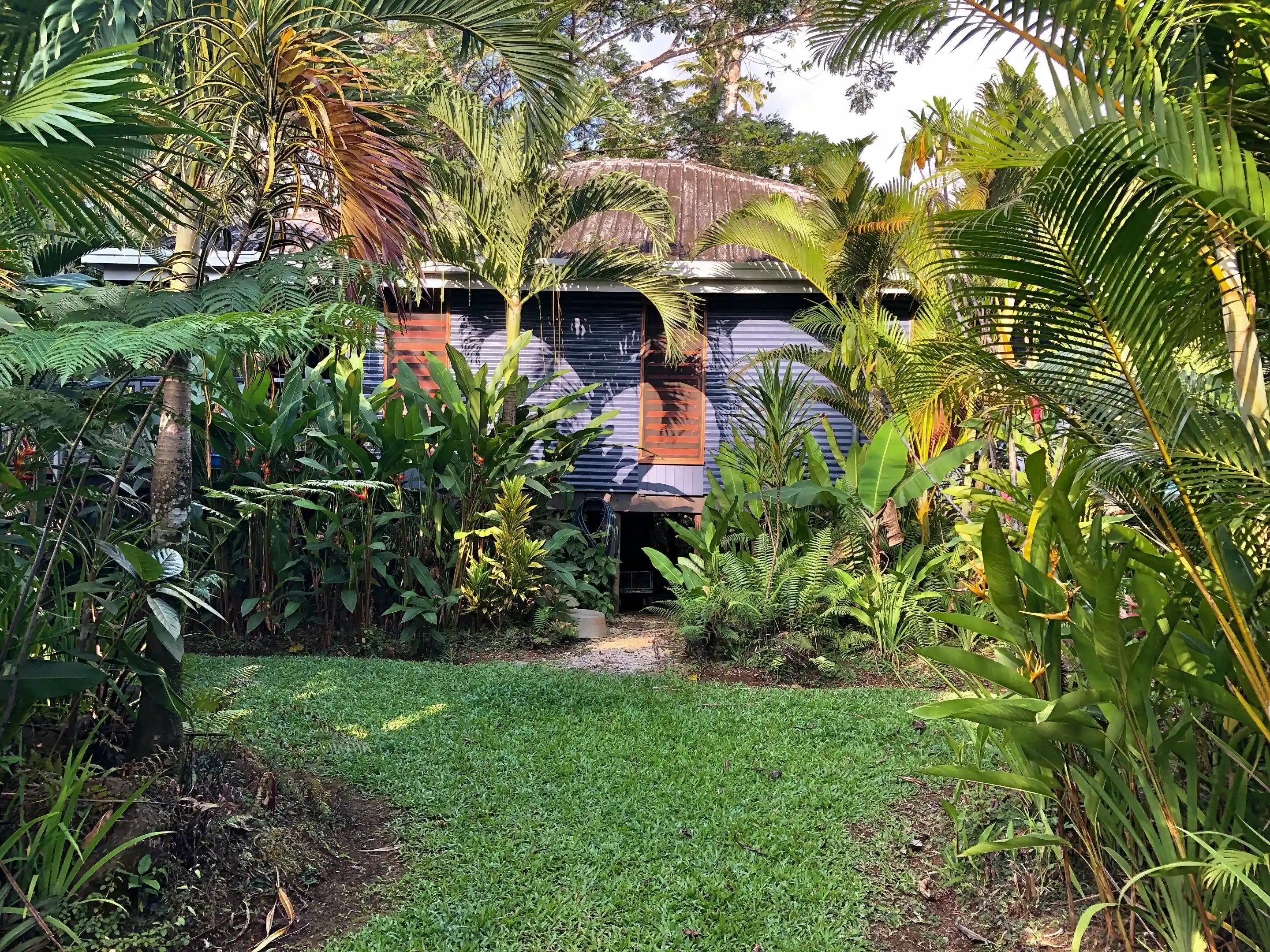 Landscaped gardens surround both villas