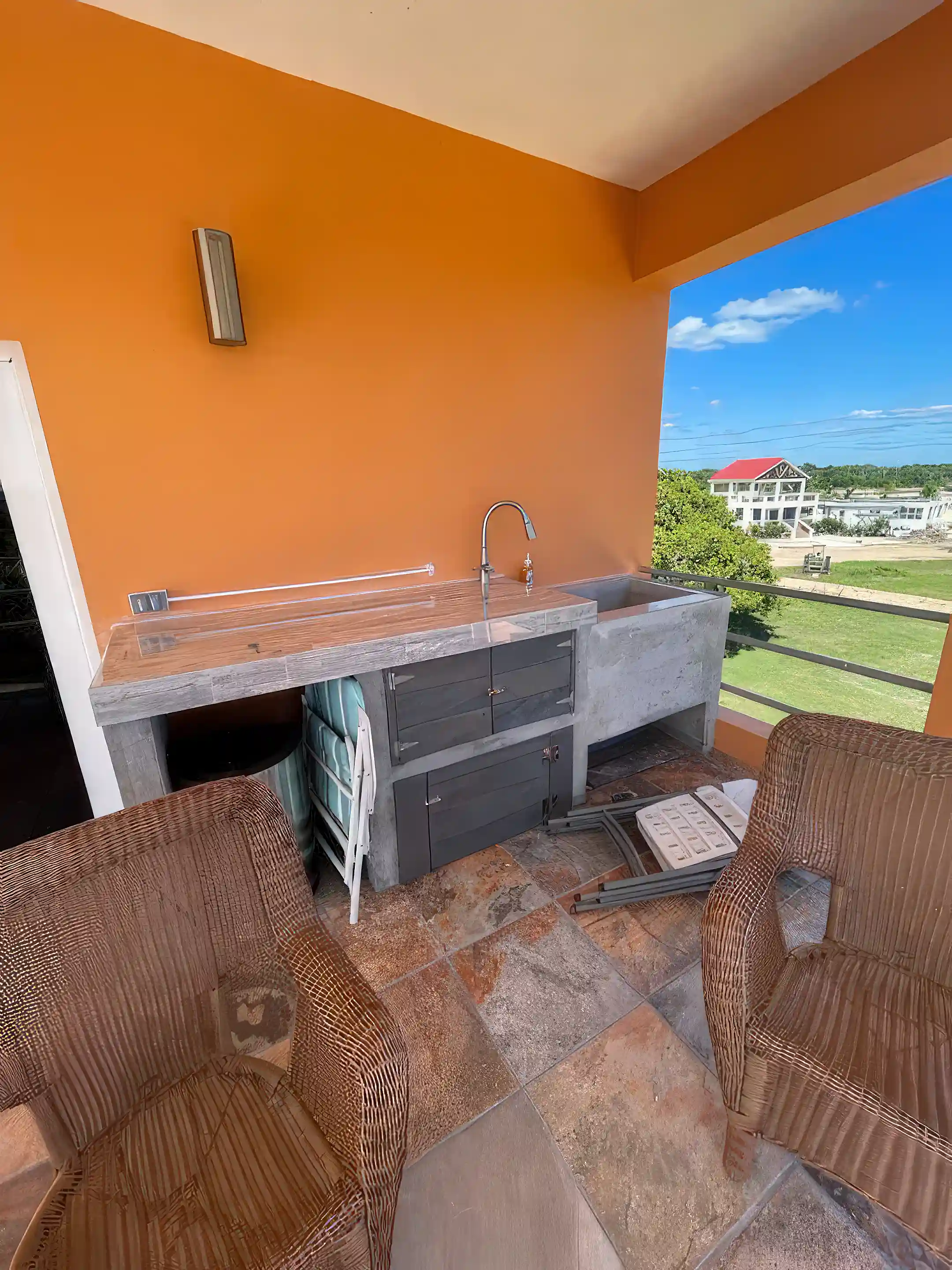 Outdoor sink serving entertainment area