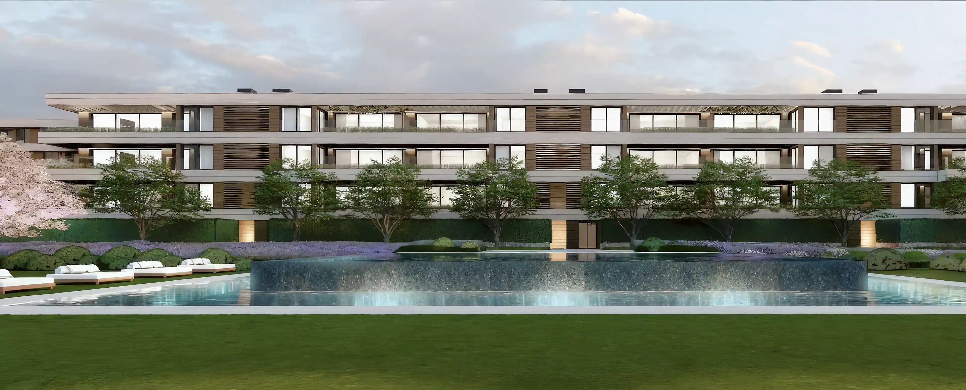 This modern luxury residence in La Moraleja features expansive gardens...