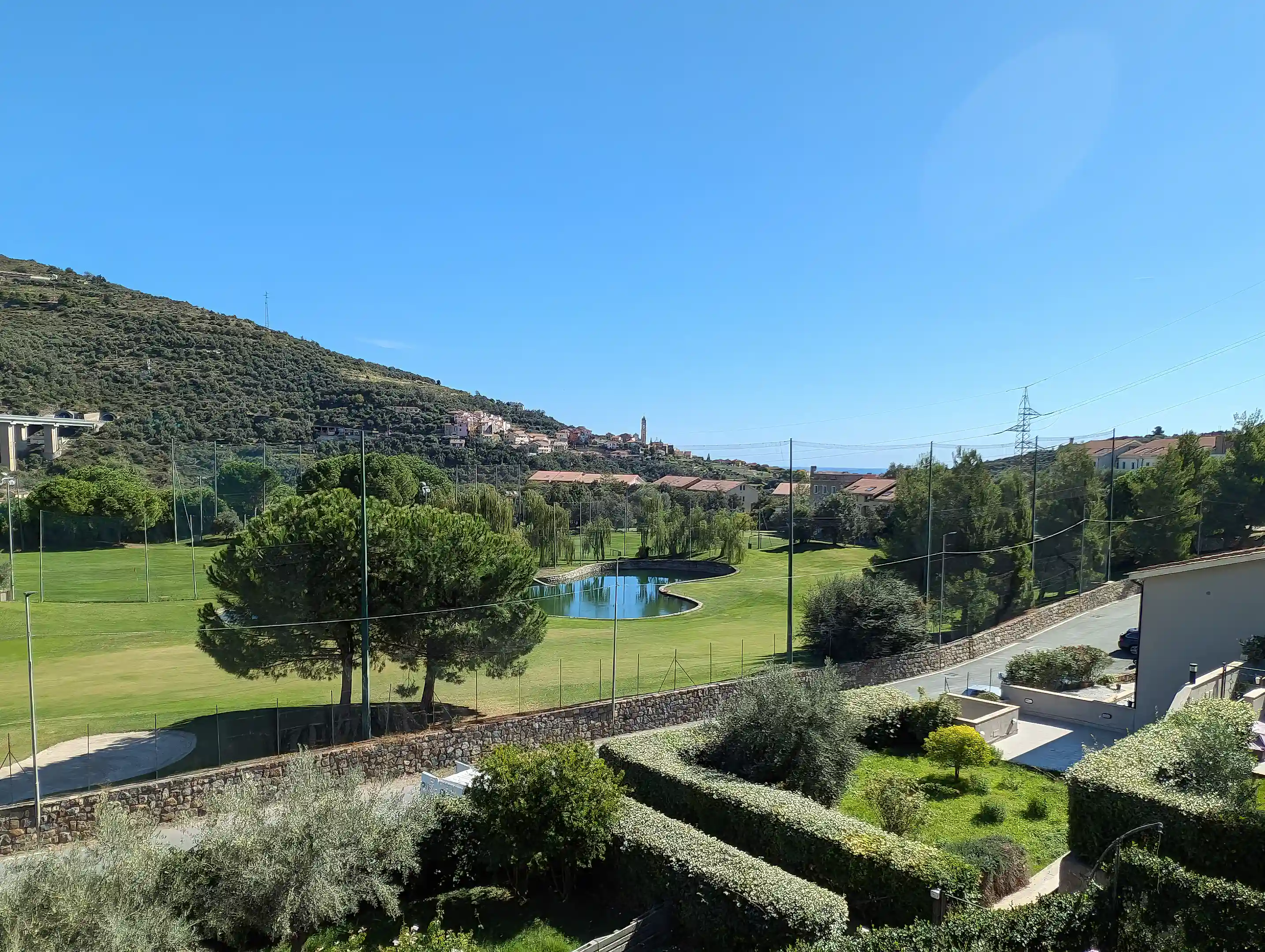 Golf court view with sea at horizon