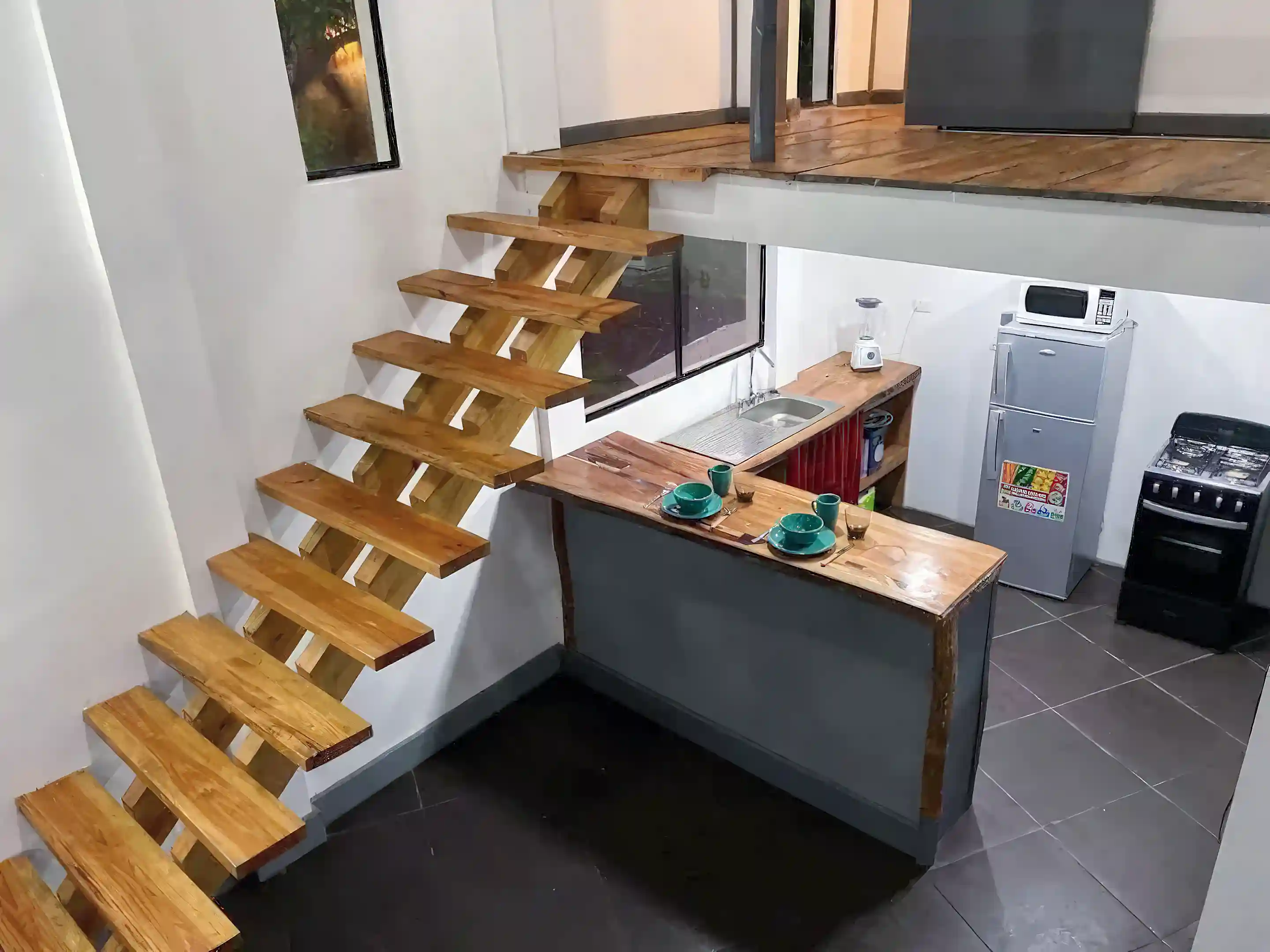 stairs to upstairs bedroom and loft area