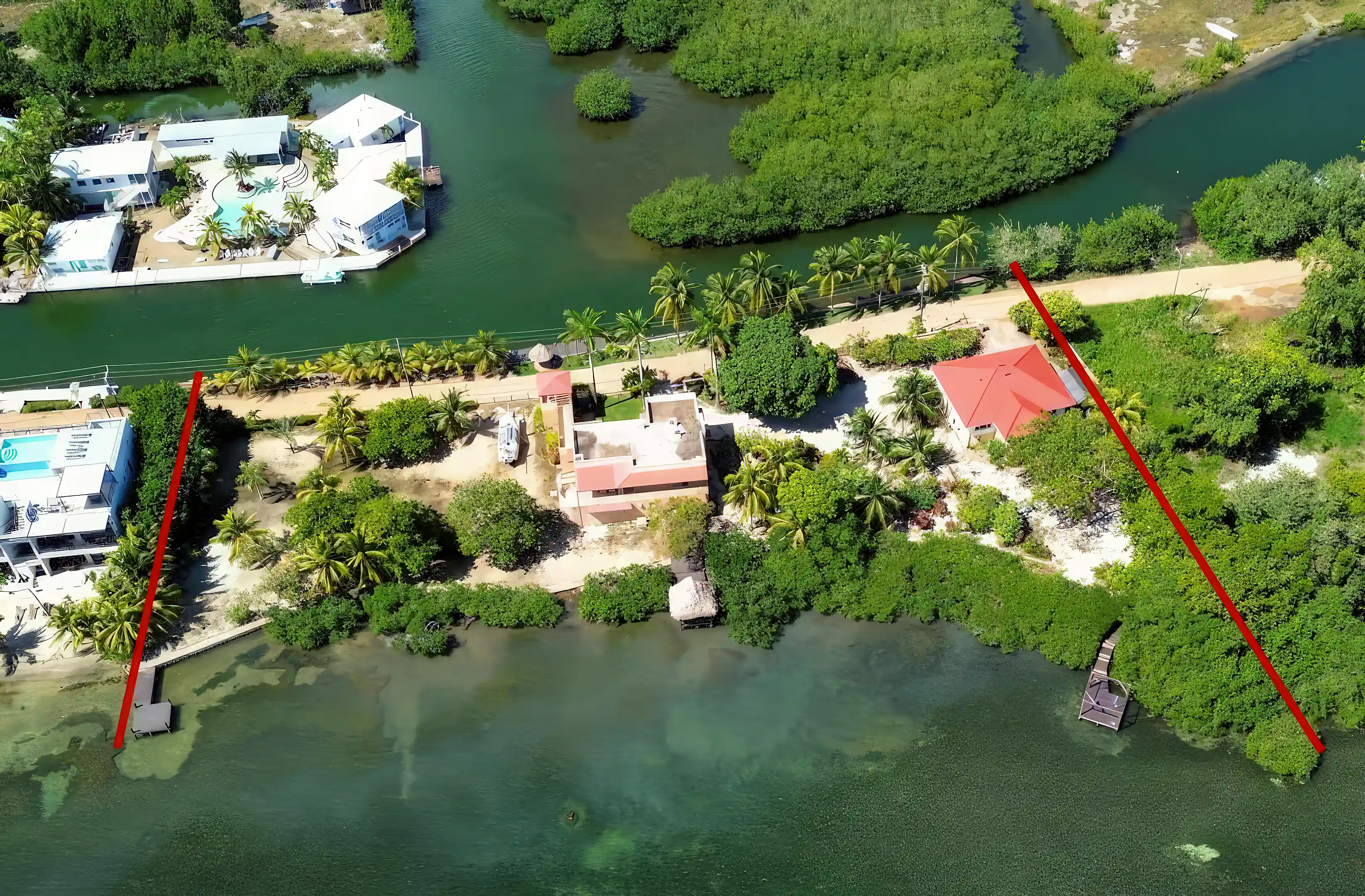 Aerial view of Sunrise Bay, bordering the Placencia Lagoon on...