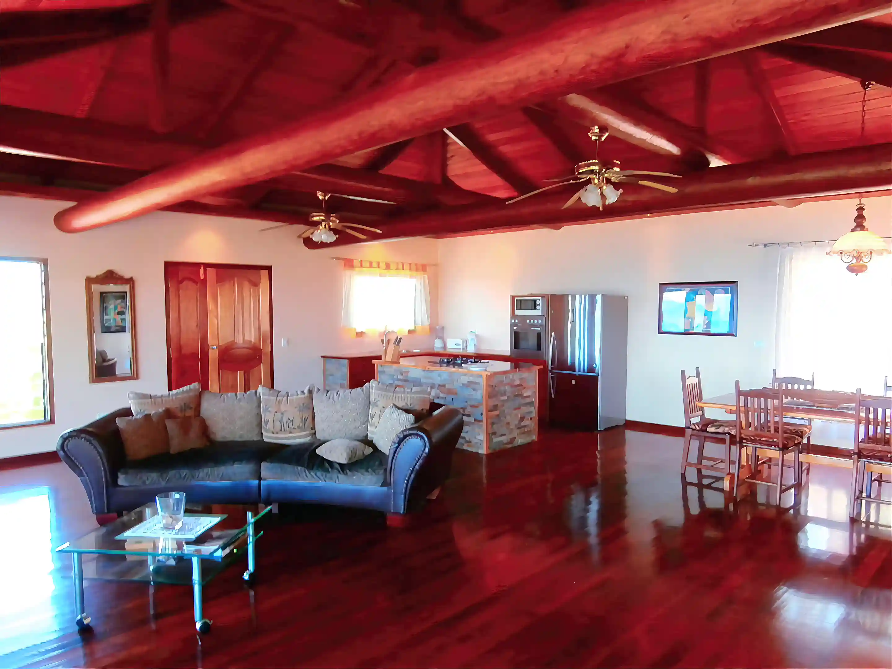 living room with open dining and kitchen