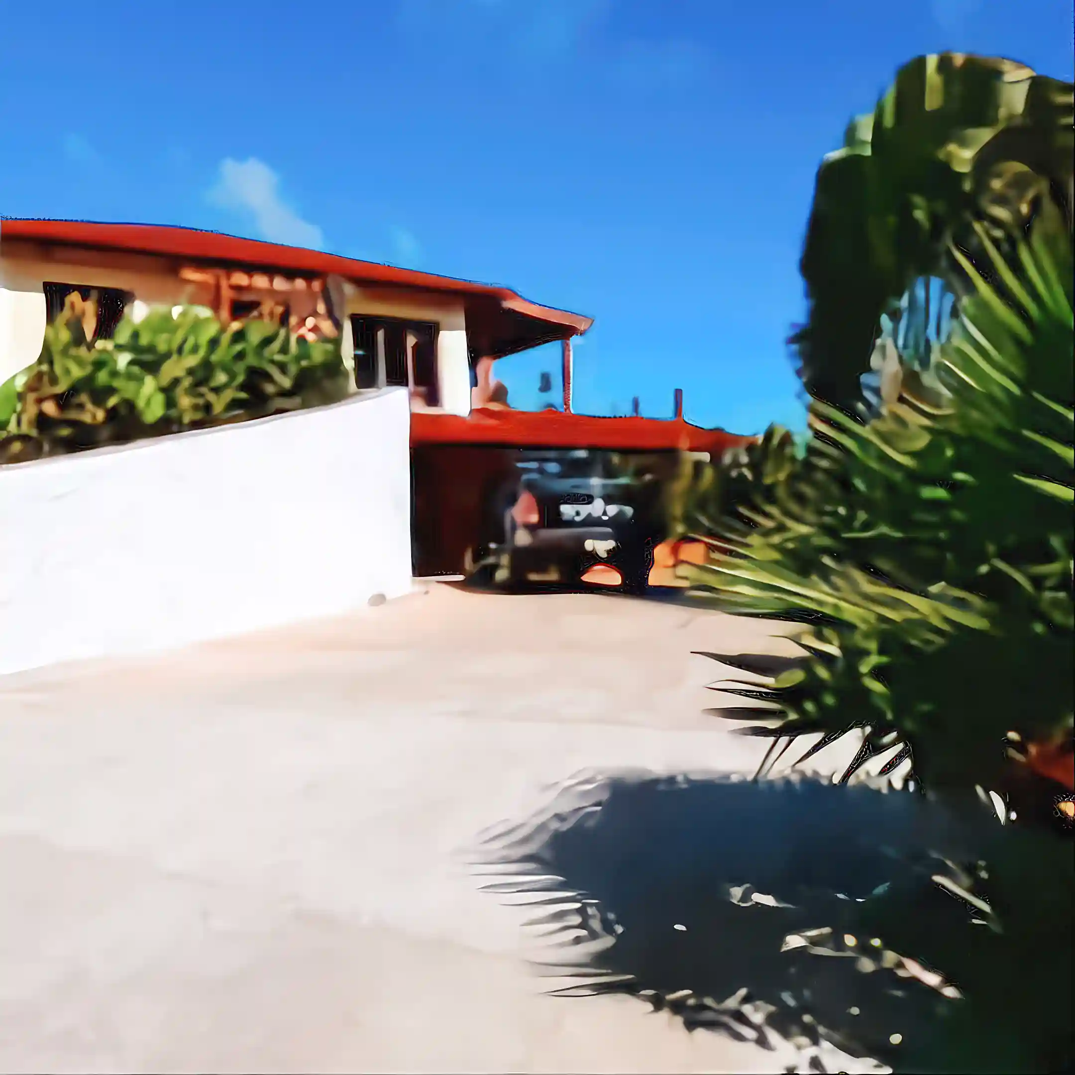 parking and entrance of the villa