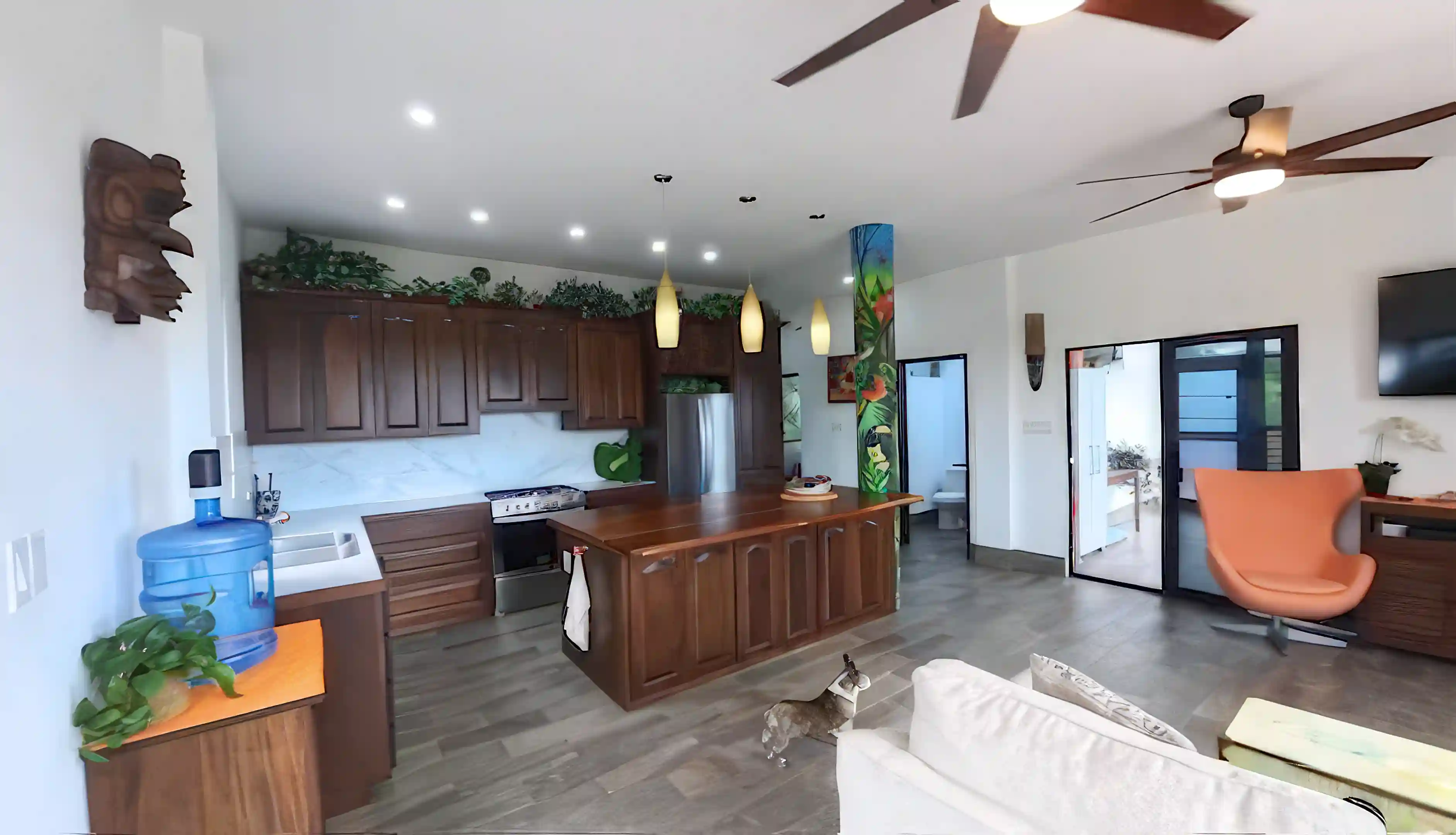 The kitchen along side the living room.