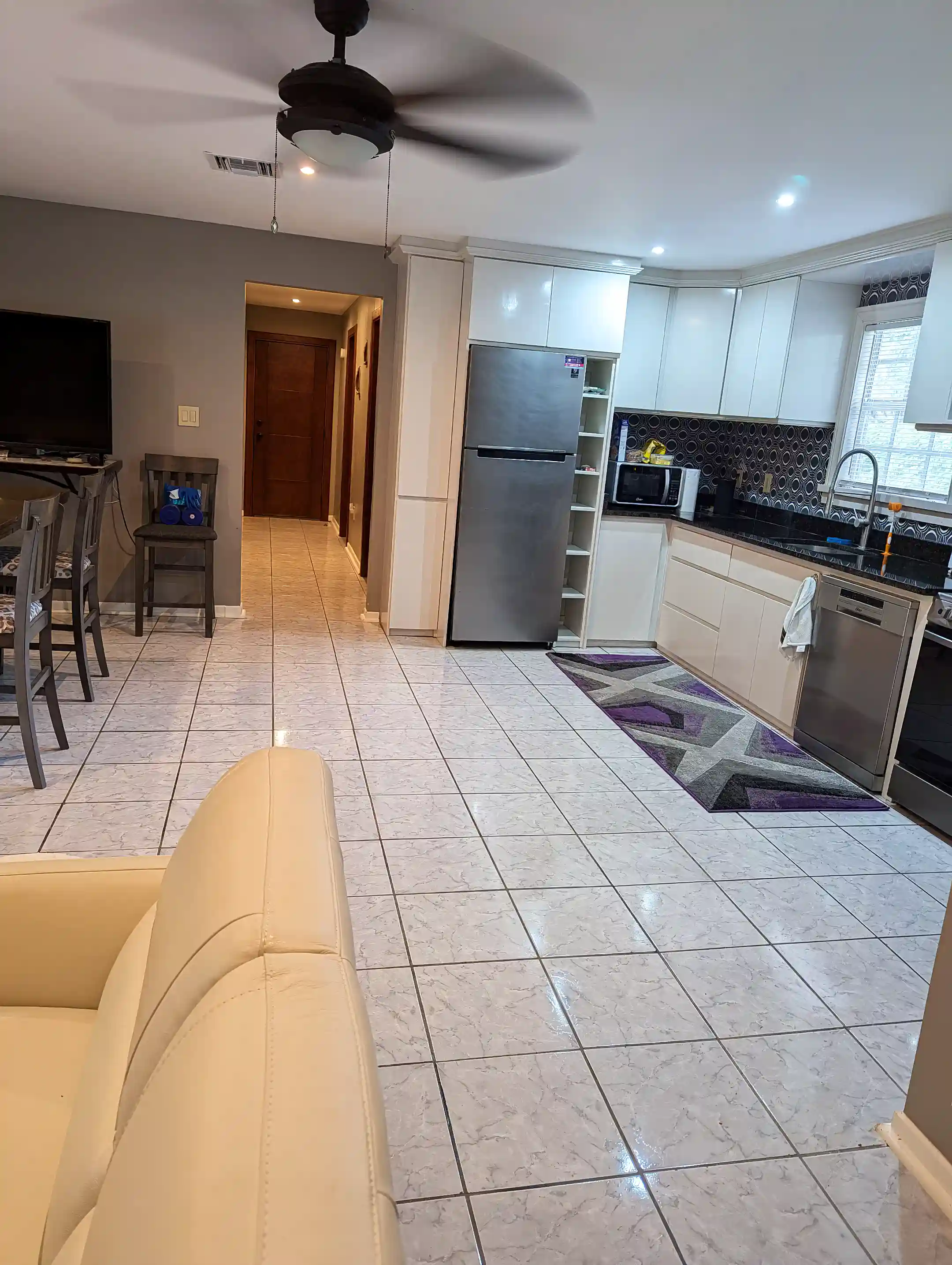 Looking down the hall into the guest wing. Open concept...