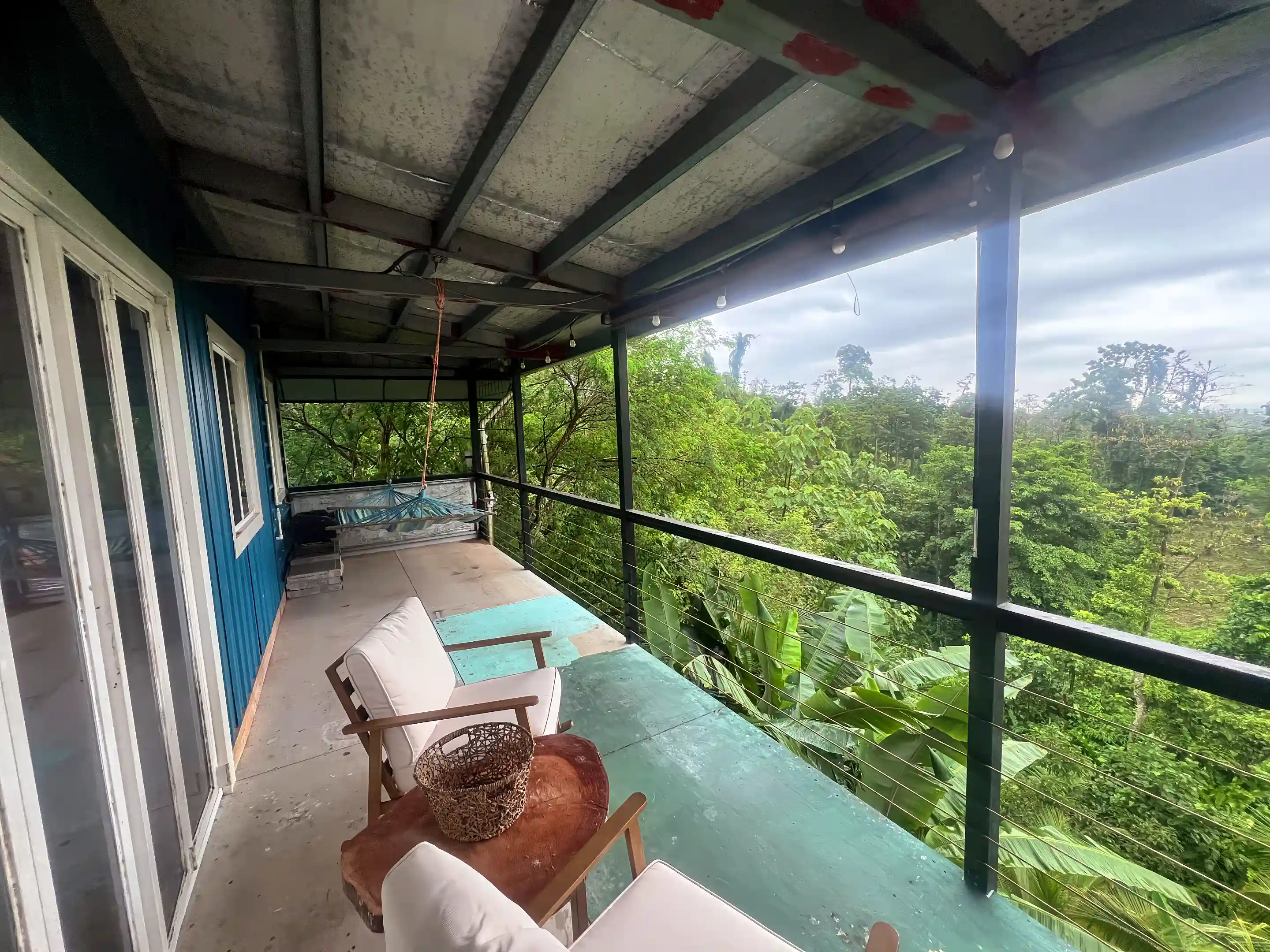 From the living area, walk through the wide doors onto...