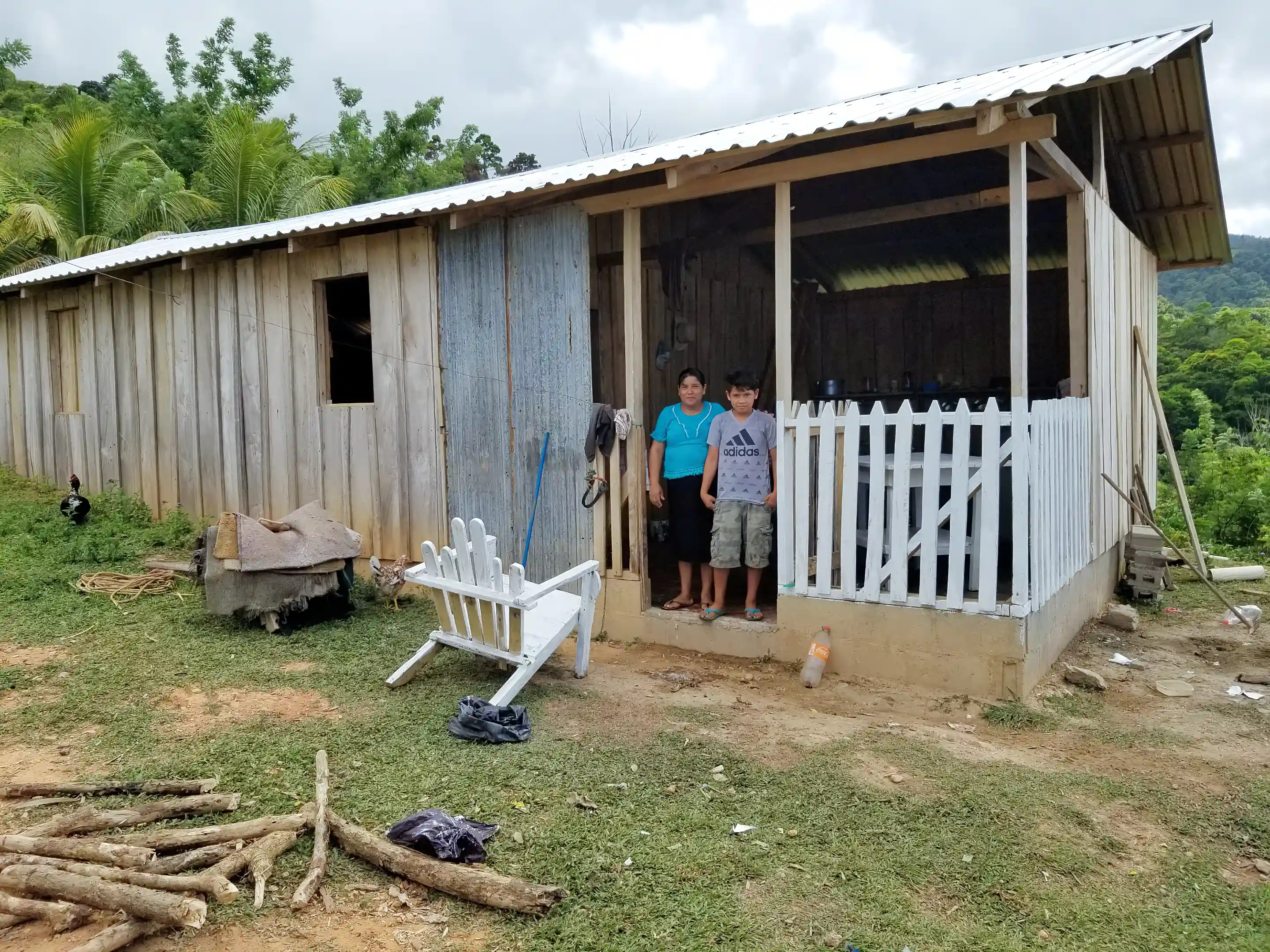 Caretaker's house, permanent property of the landowner. Woman and her...
