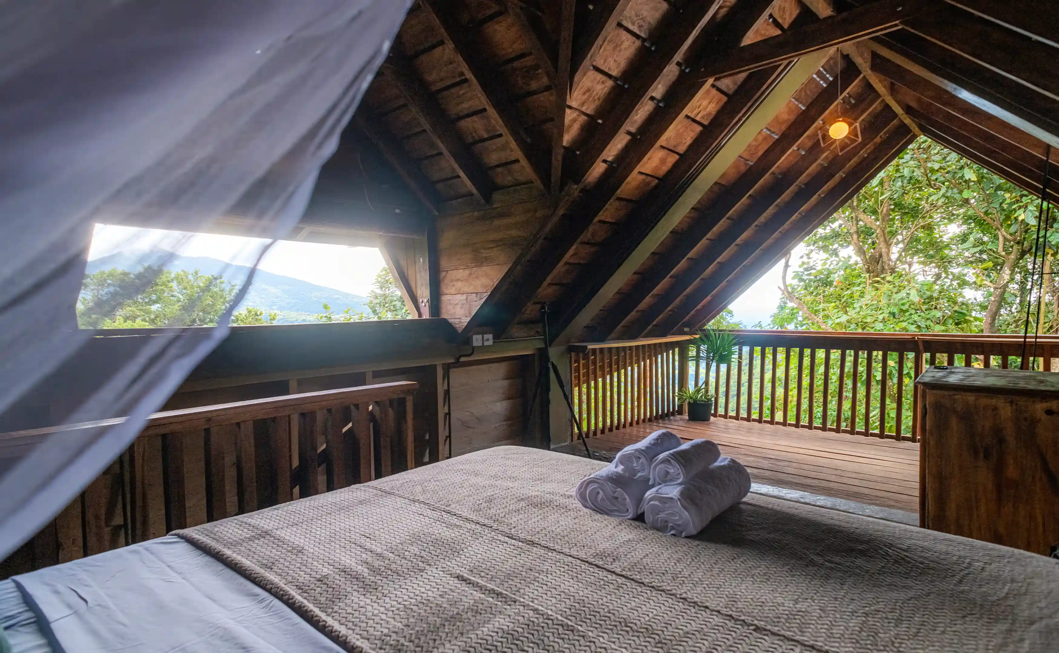 Bedroom view overlooking mountains, valley, river and distant ocean