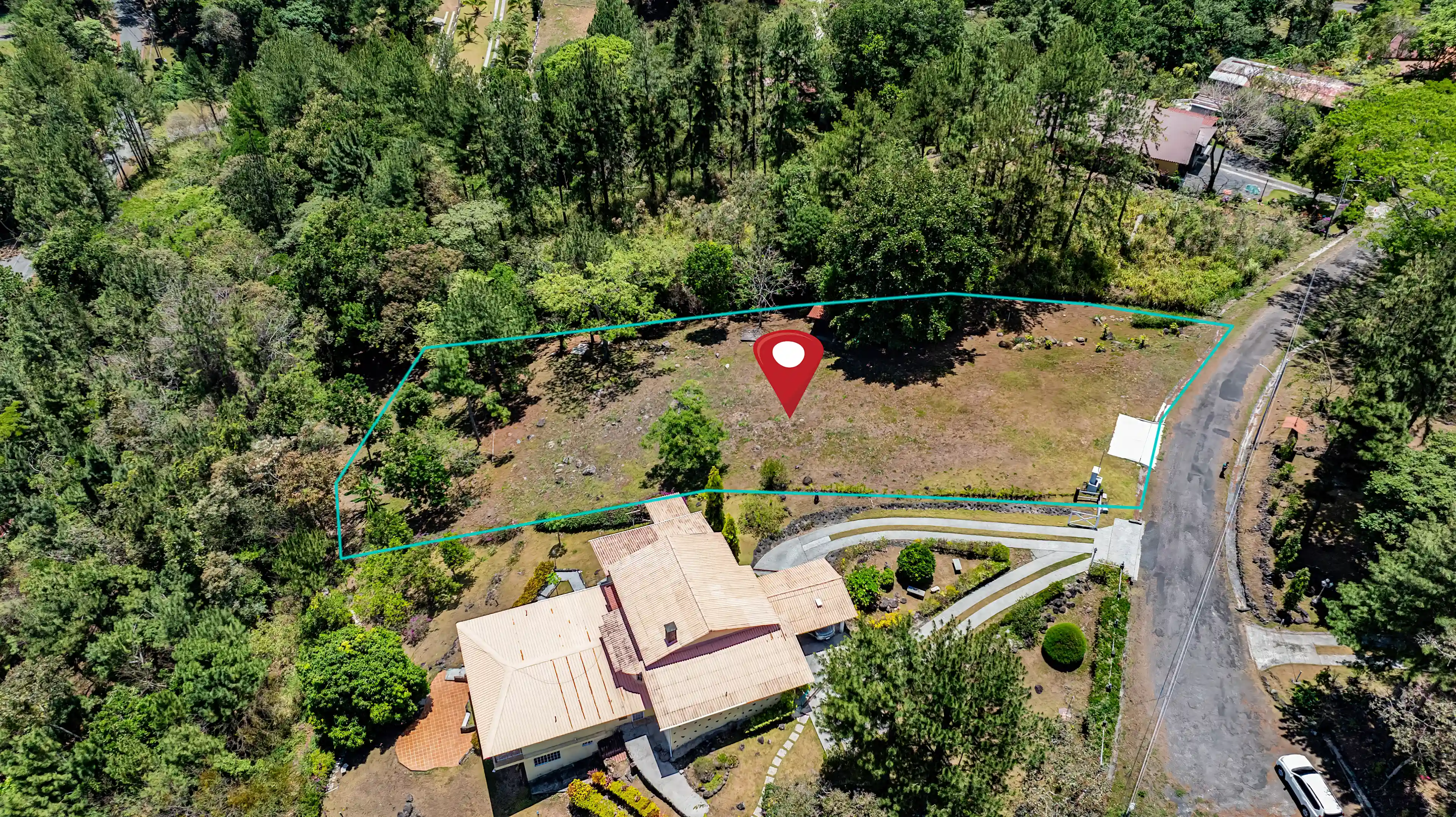 Aerial view with property boundary outlined, showing the exact size...