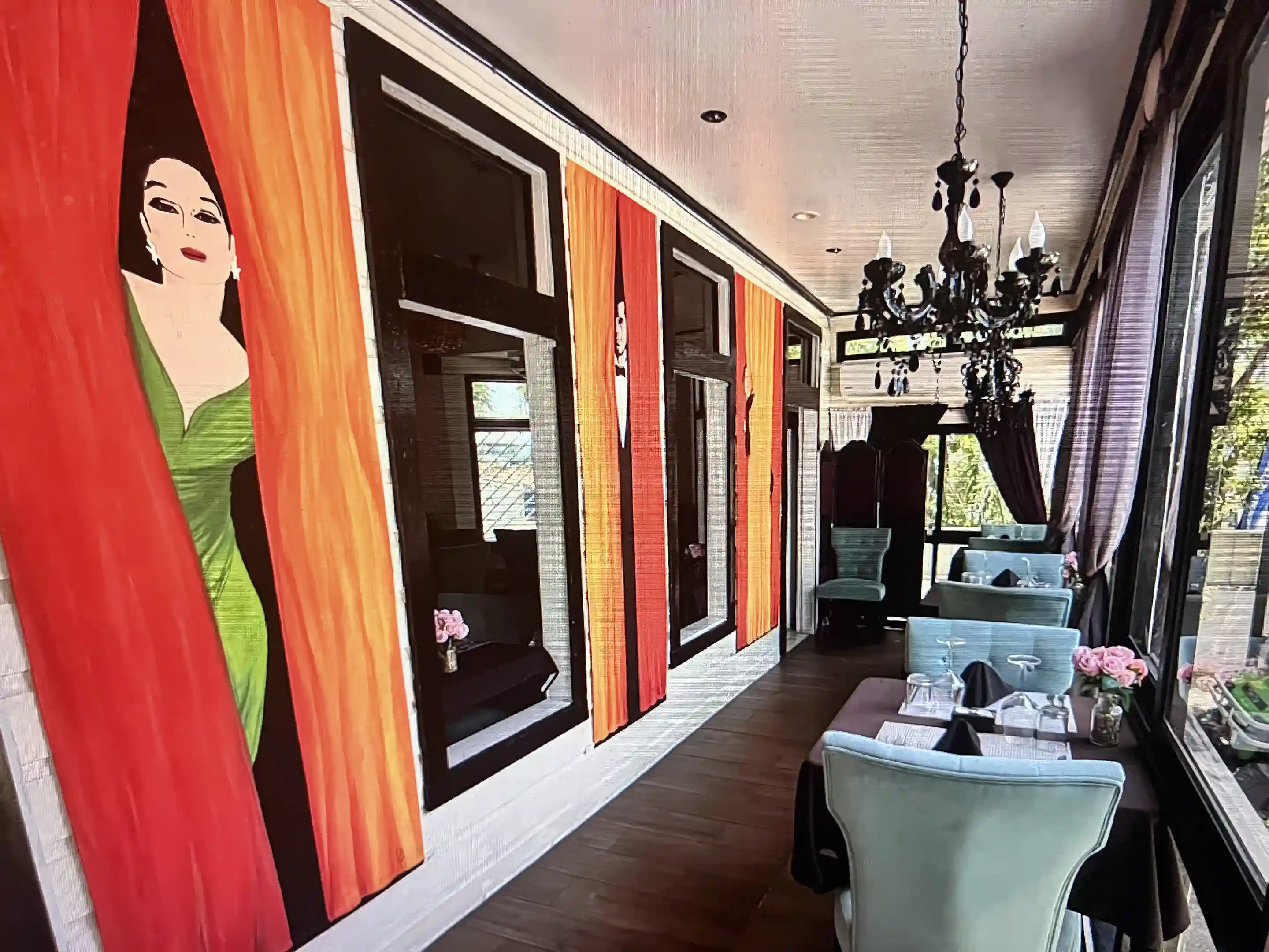 Street Front Dining / chandeliers and Floor to Glass wall...