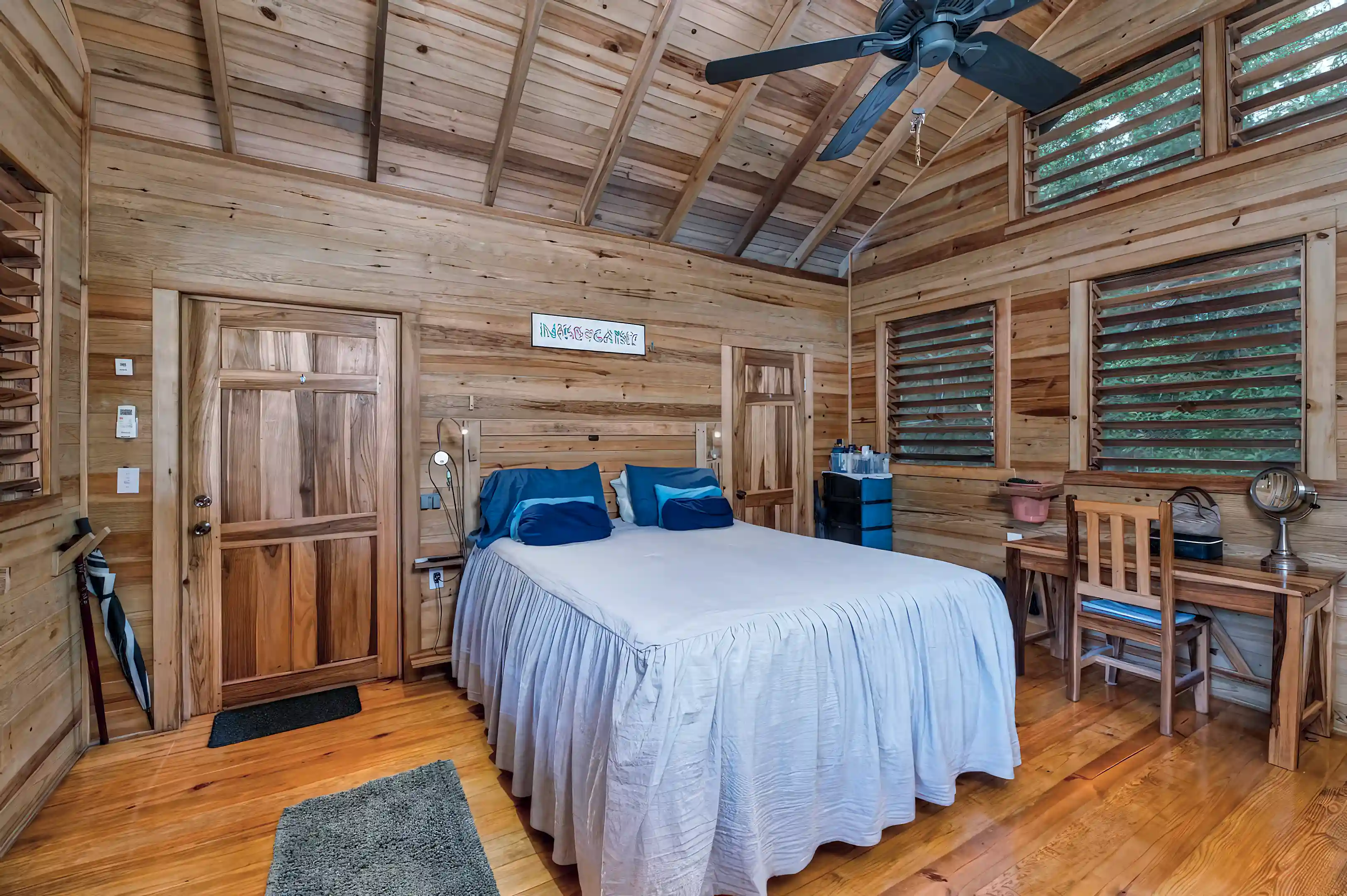 Bedroom, open design. Hand-built Luarelwood Desk and chair. Ceiling Fan,...