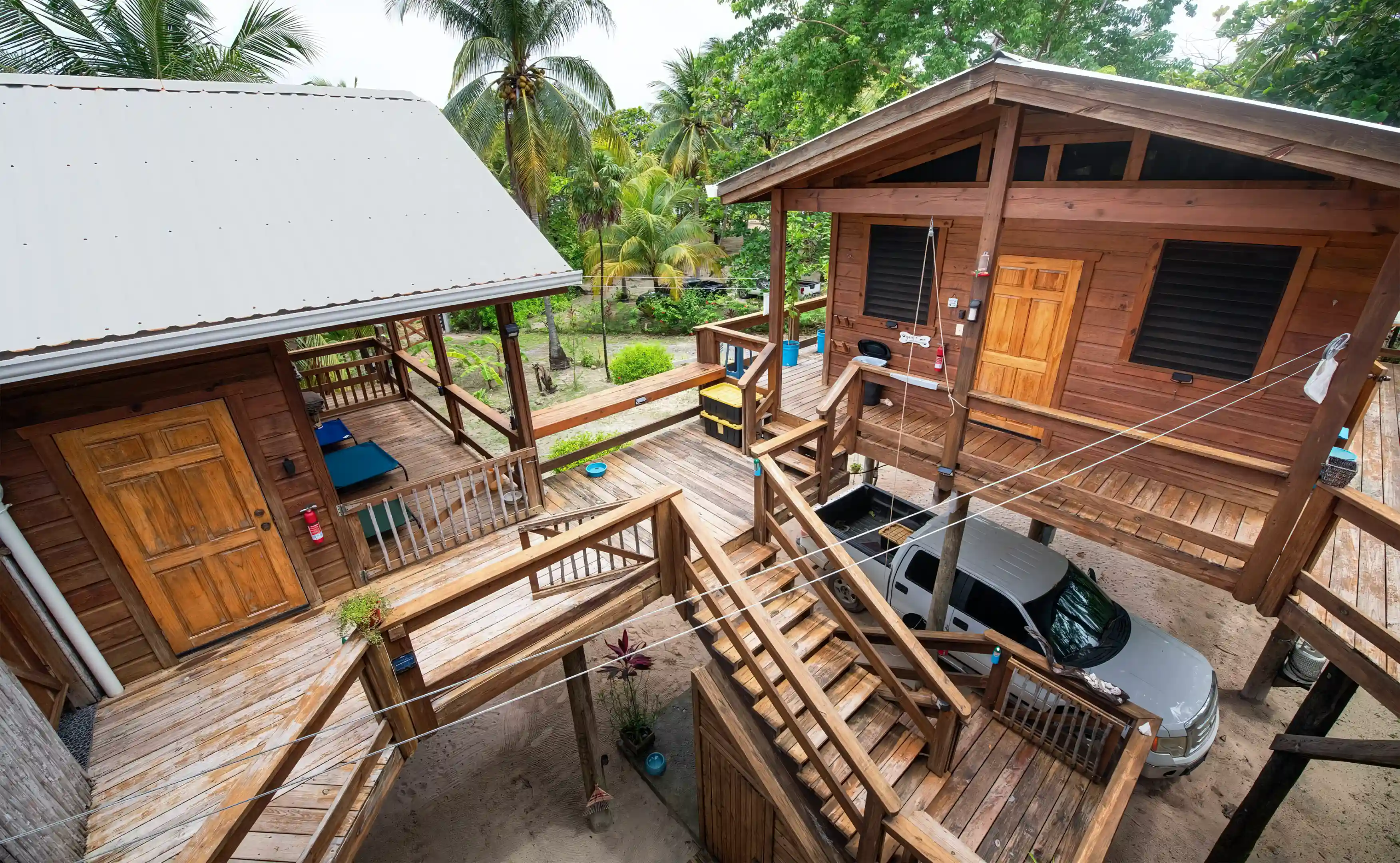 Open decks abound, with rain-catchment off the three roofs, collected...