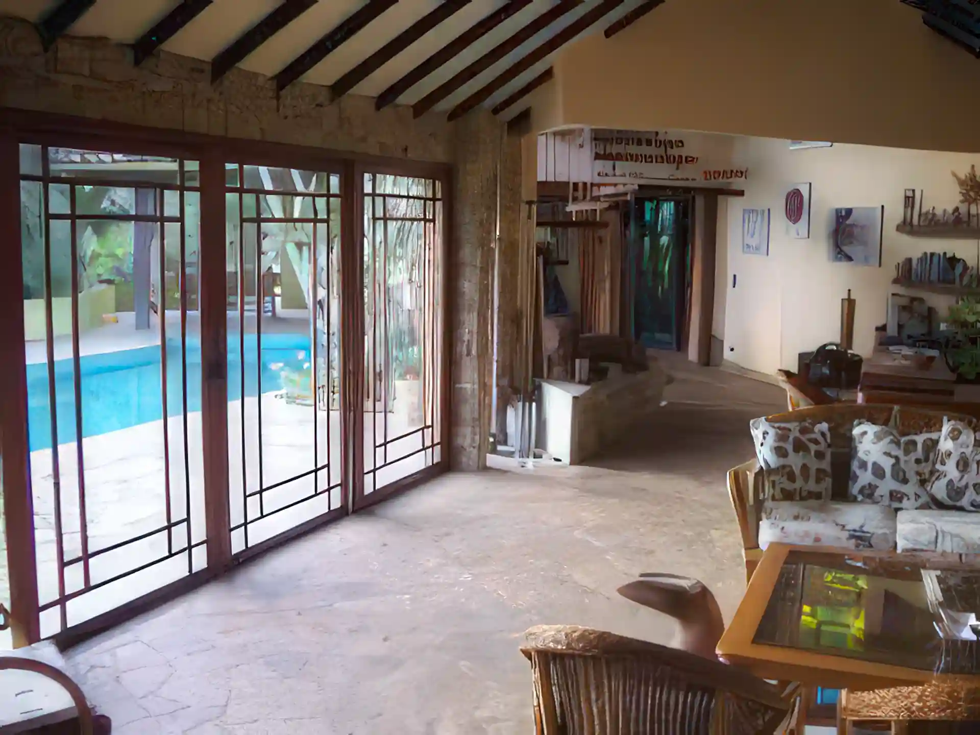 Partial view of living room with wet bar.