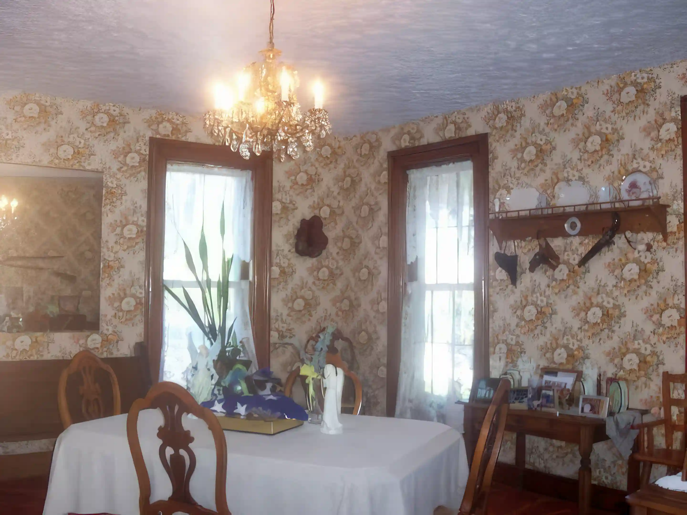 Formal dining room with original chandelier