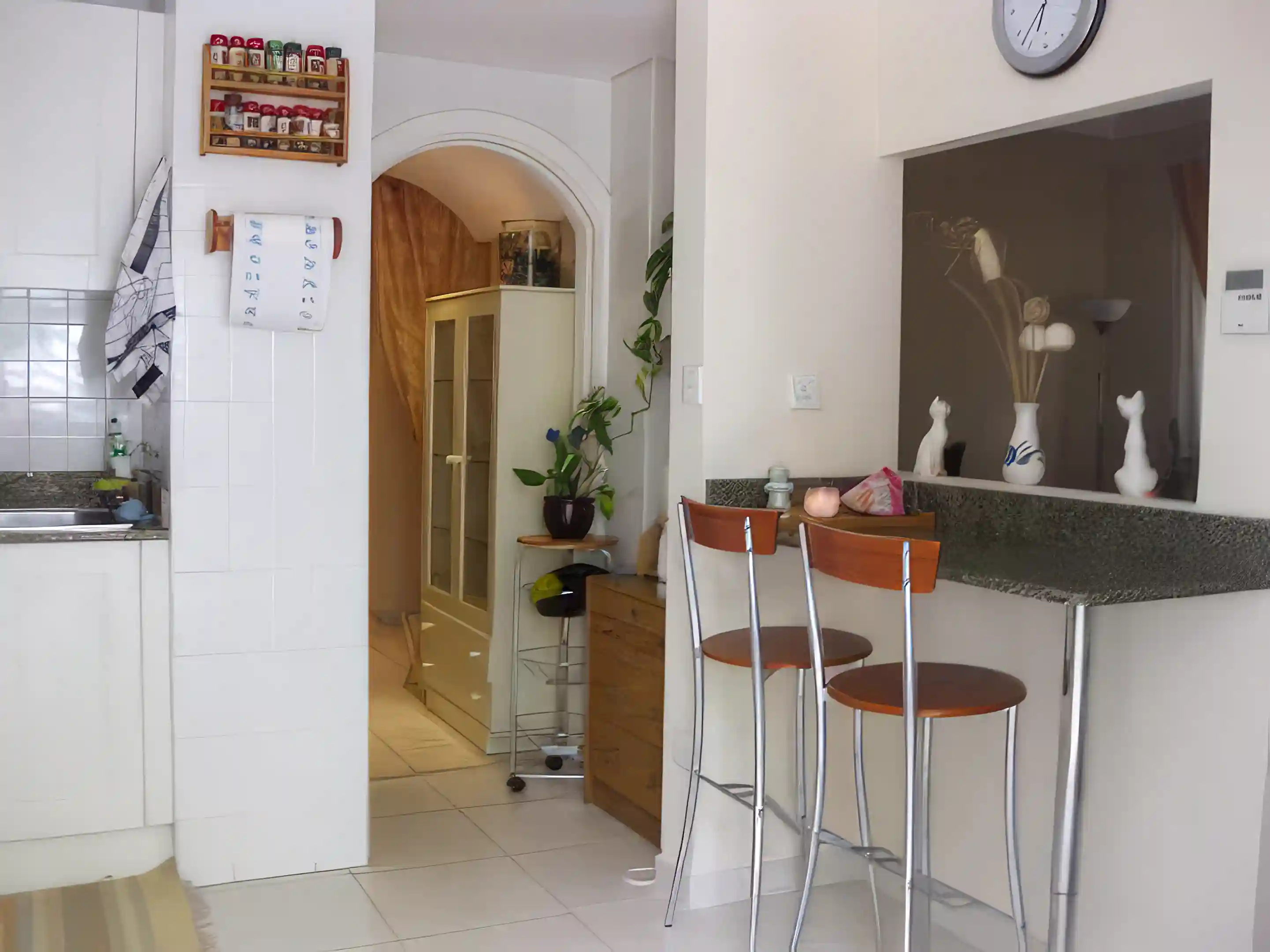 kitchen view with breakfast bar